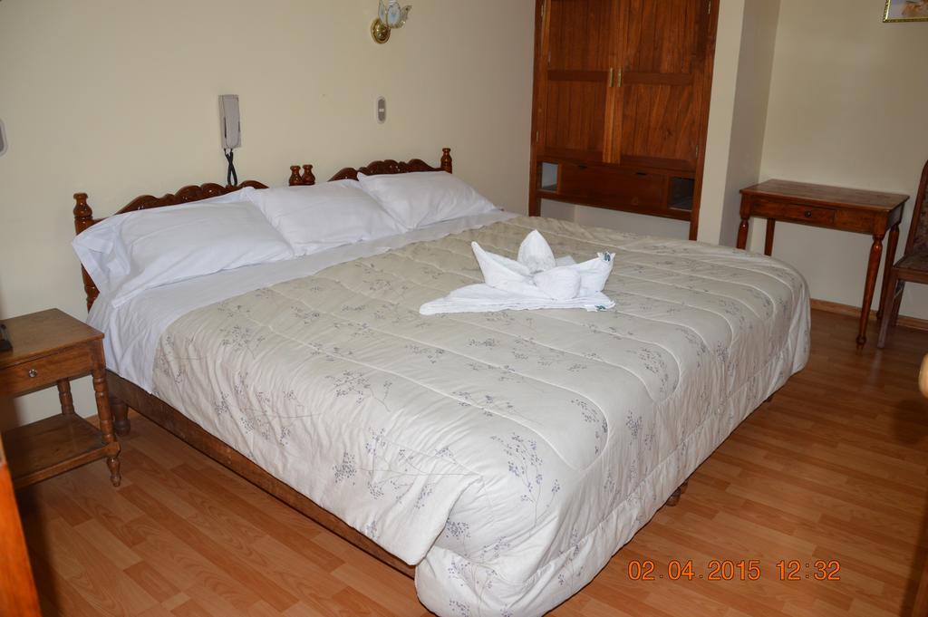 Hostal Huaynapata Куско Номер фото